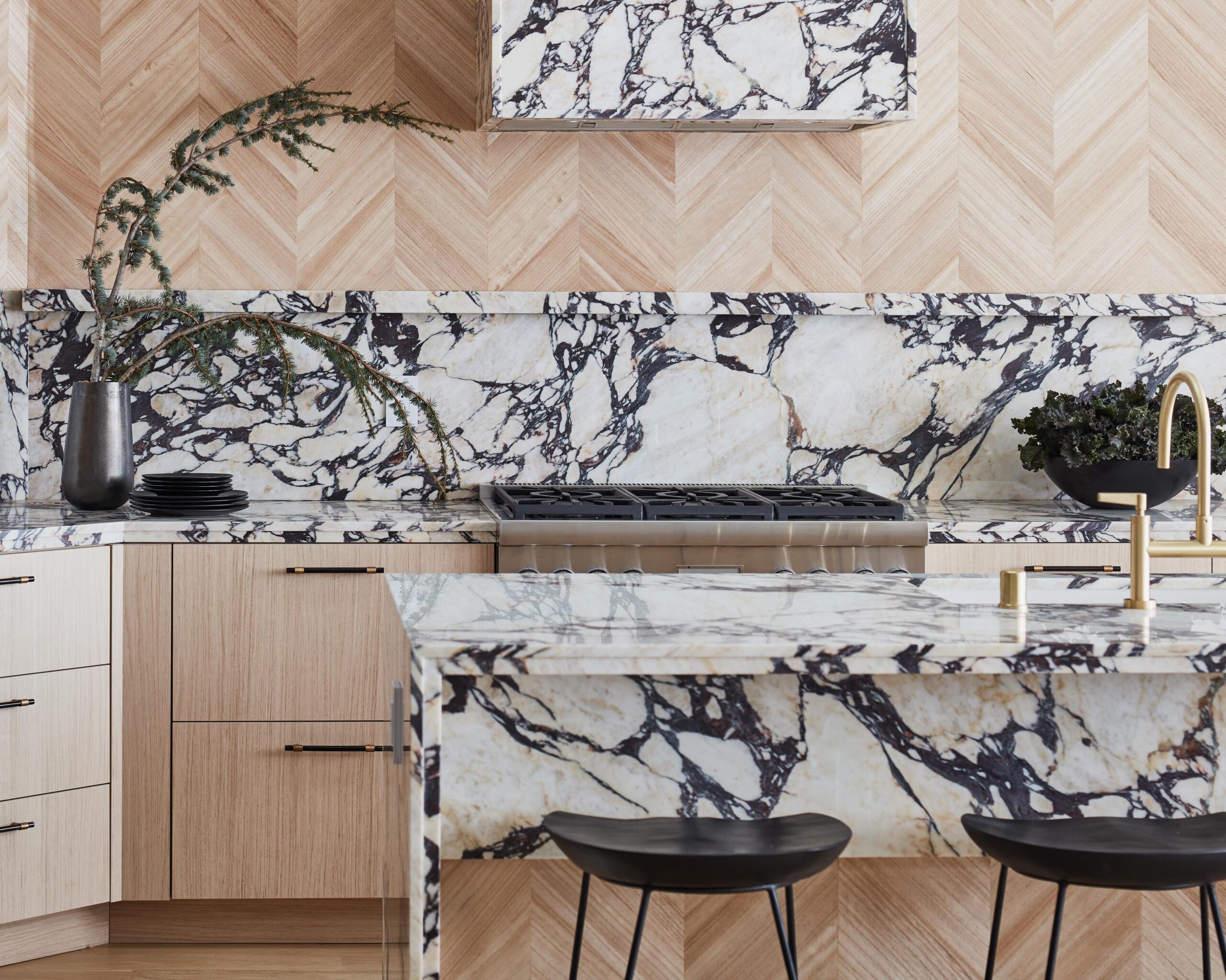 modern kitchen with calacatta viola island and backsplash