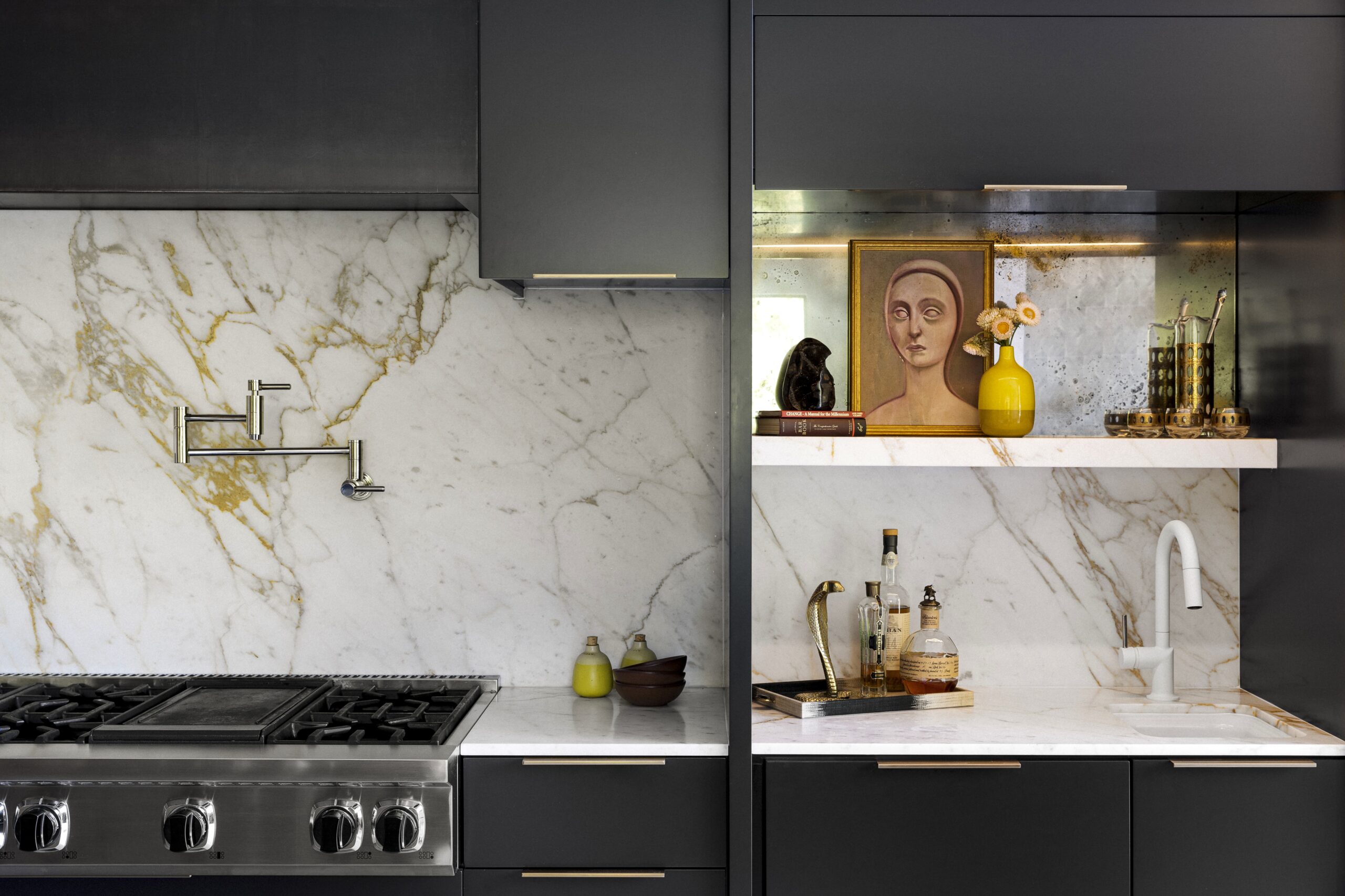 Calacatta Vagli Marble shown on backsplash and counter in upscale kitchen.